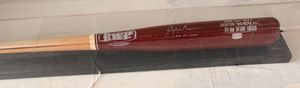 Baseball Bat  signed by Justin Morneau - 2006 AL MVP title and stats