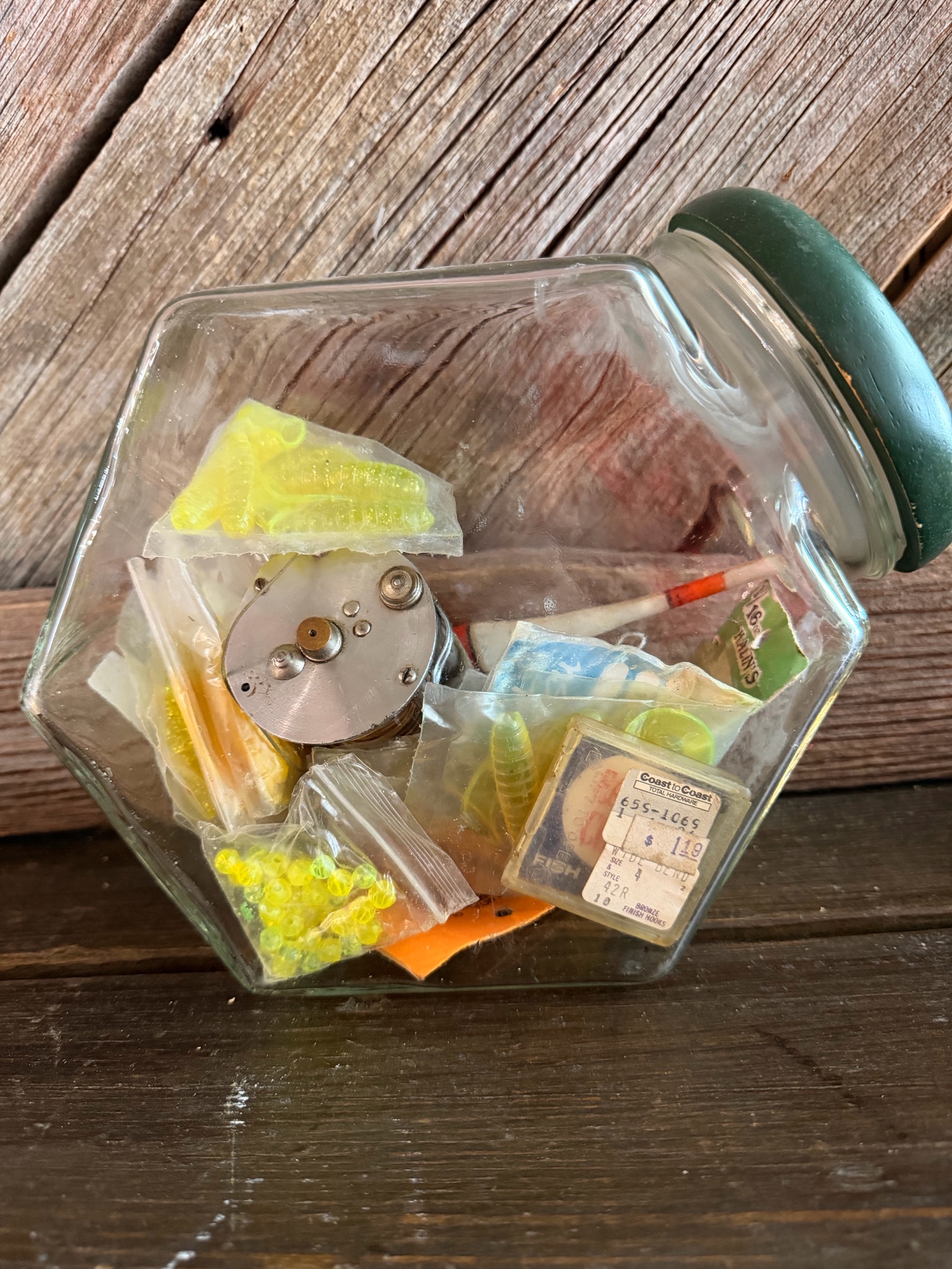 Glass Jar with Various Fishing Tackle