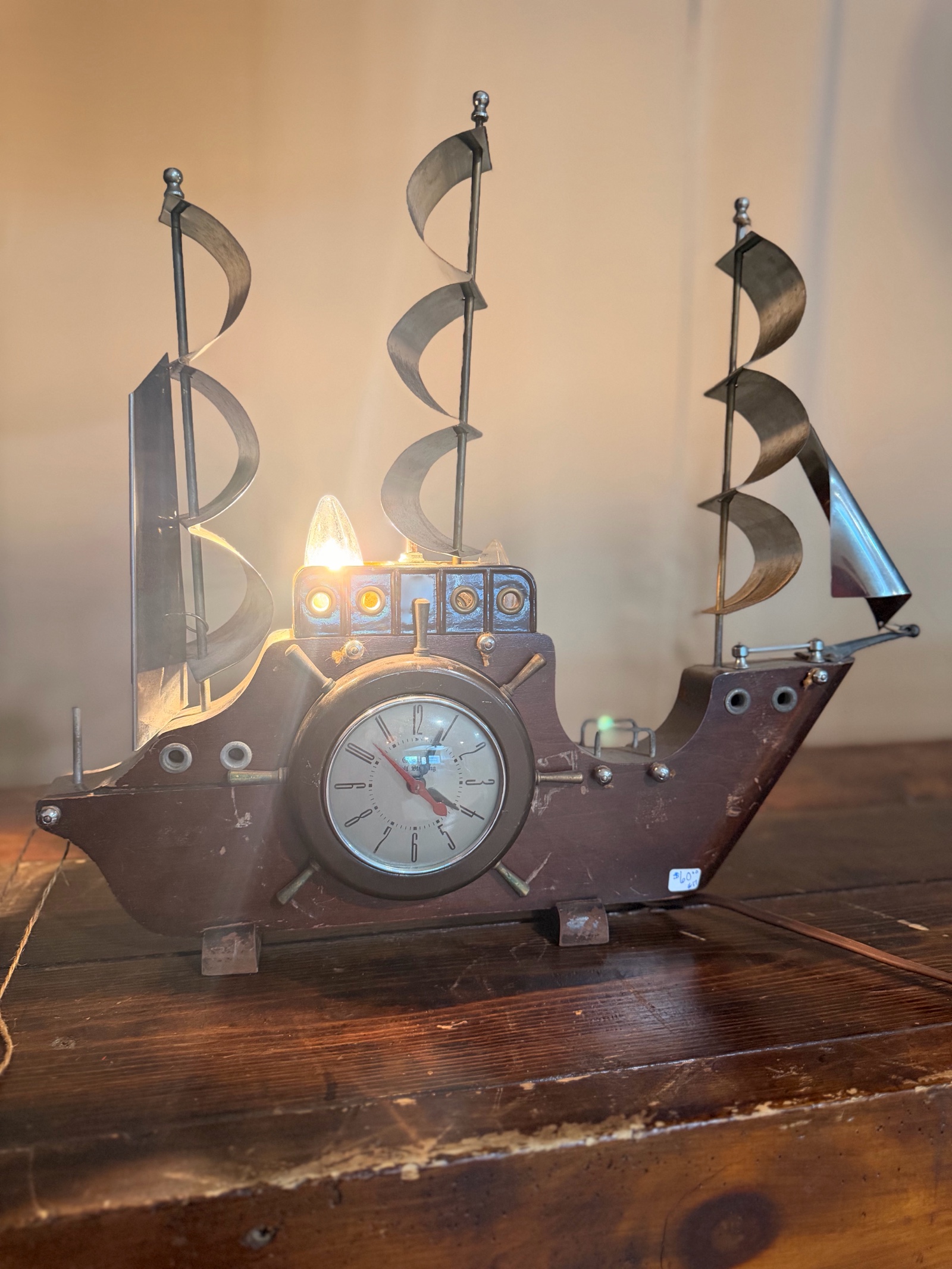 Vintage United Clock Corp Ship Clock & Lamp featuring a wooden body and metal sails.