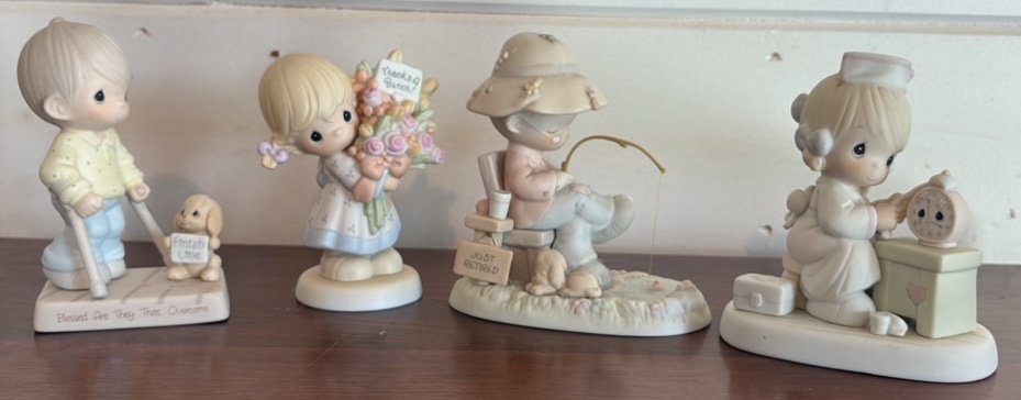 4 Precious Moments Figurines