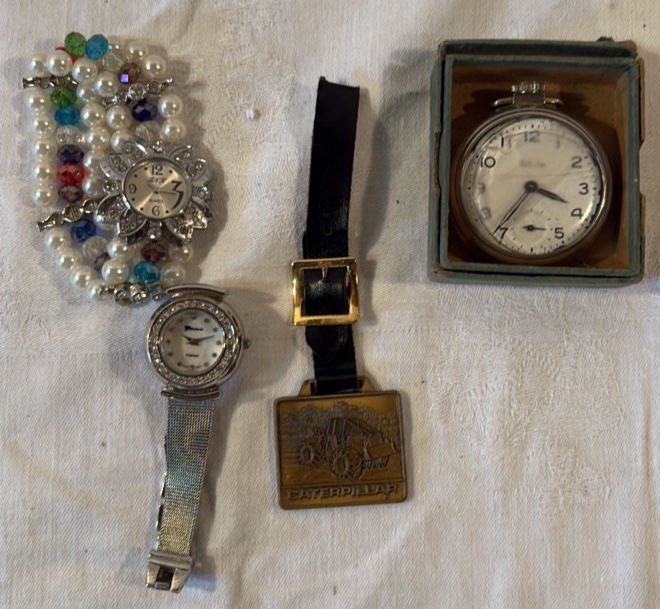 Three Vintage Watches and a Watch band