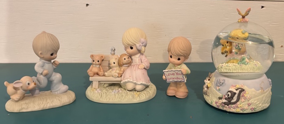 Four Precious Moments Figurines