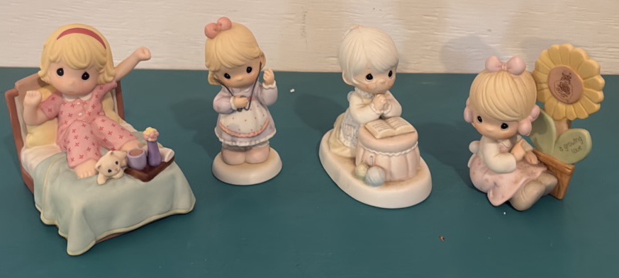 Four Precious Moments Figurines