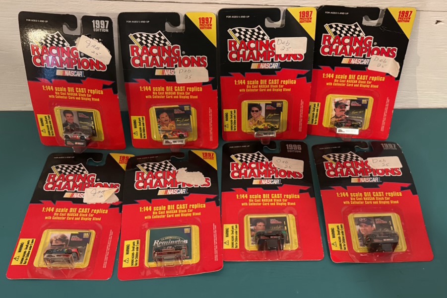 Eight 1144 Scale Racing Champions Diecast Replicas