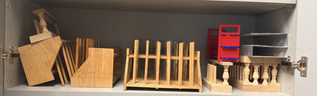 shelf of test tube holders, 11 various in lot
