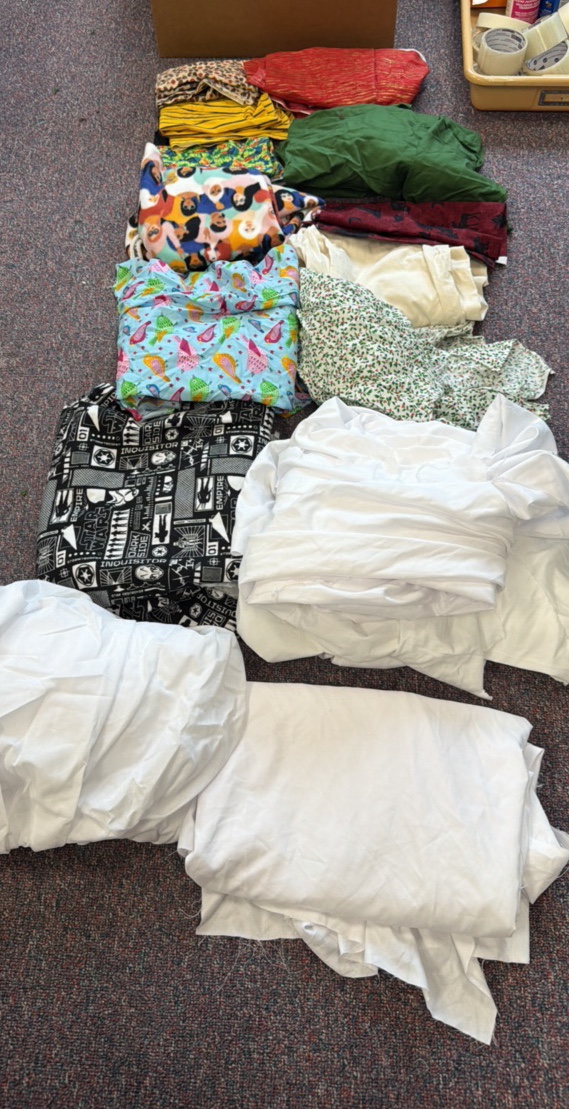 material scraps, buttons, ribbon and trim