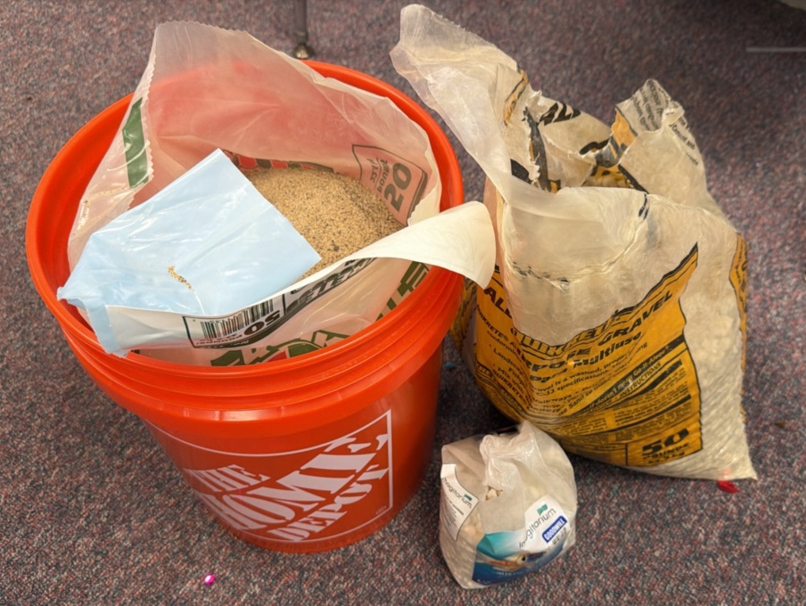 Bucket of sand, bag of gravel