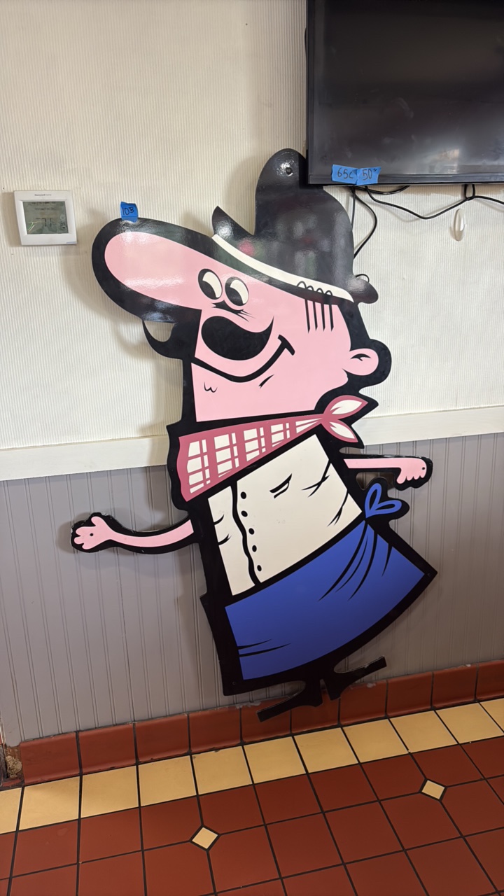 Pizza Hut Pete architectural restaurant mascot sign, wall mounted.