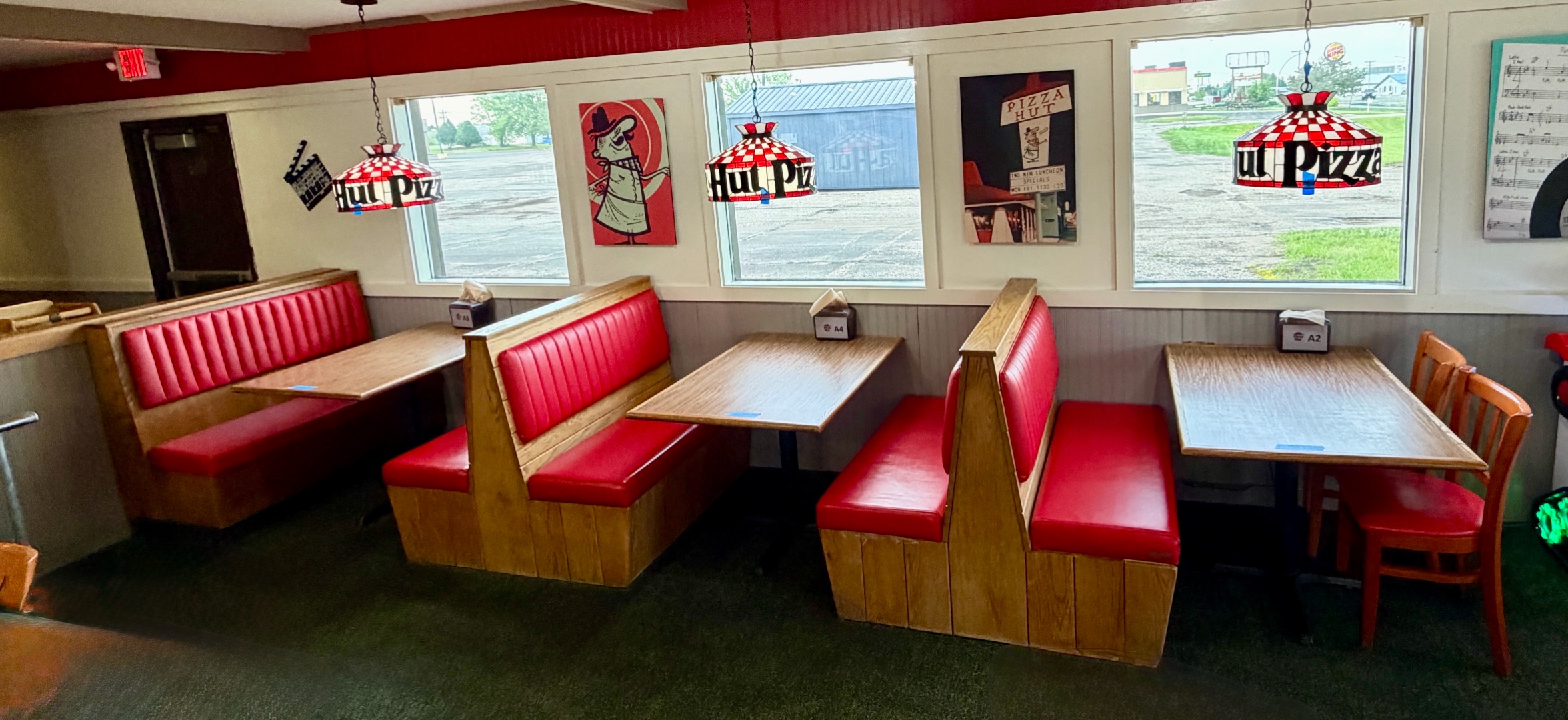 (2)Double-back booth seats (1)Single (3)tables (2)chairs