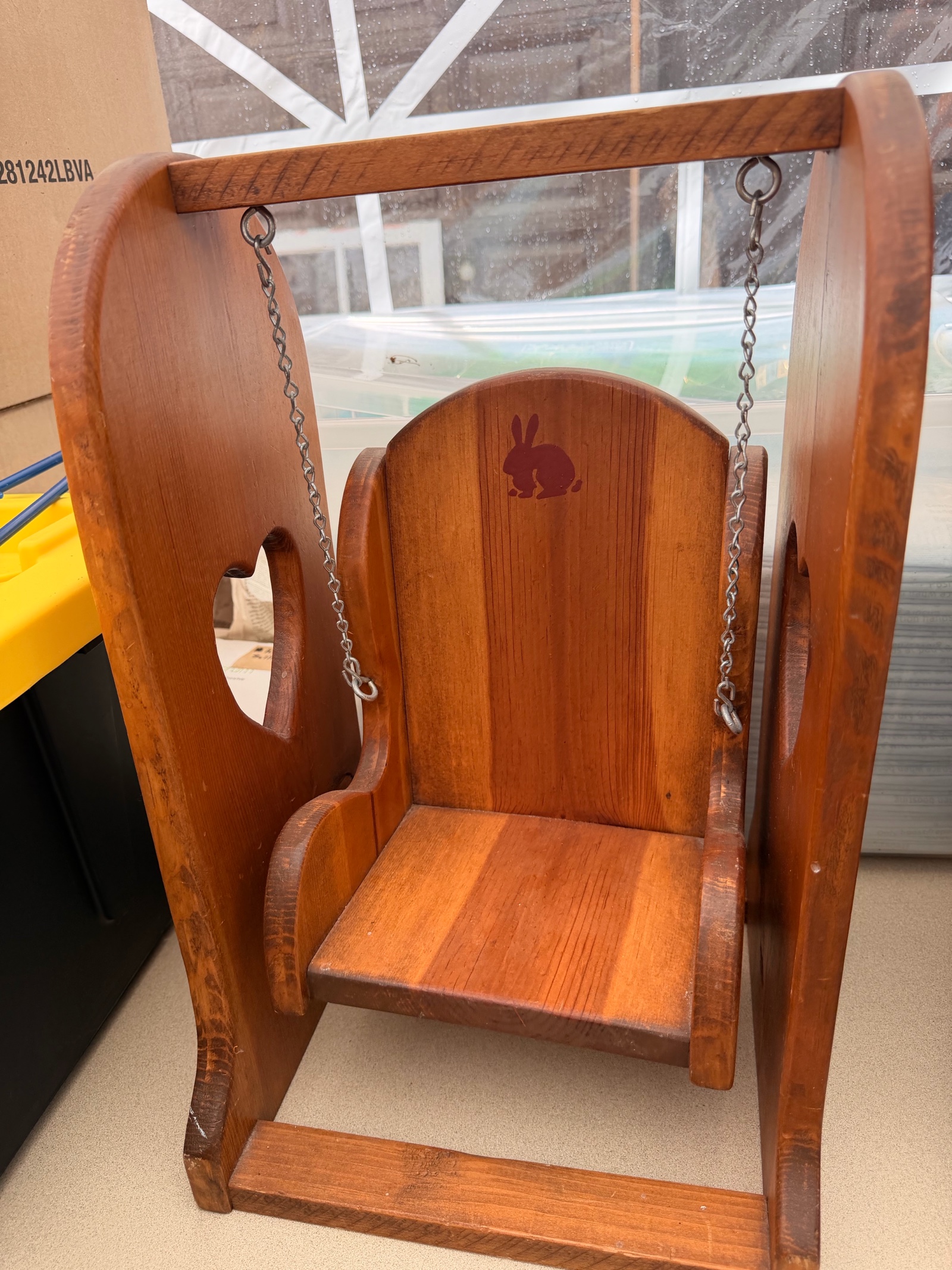 Antique wooden swinging chair decor