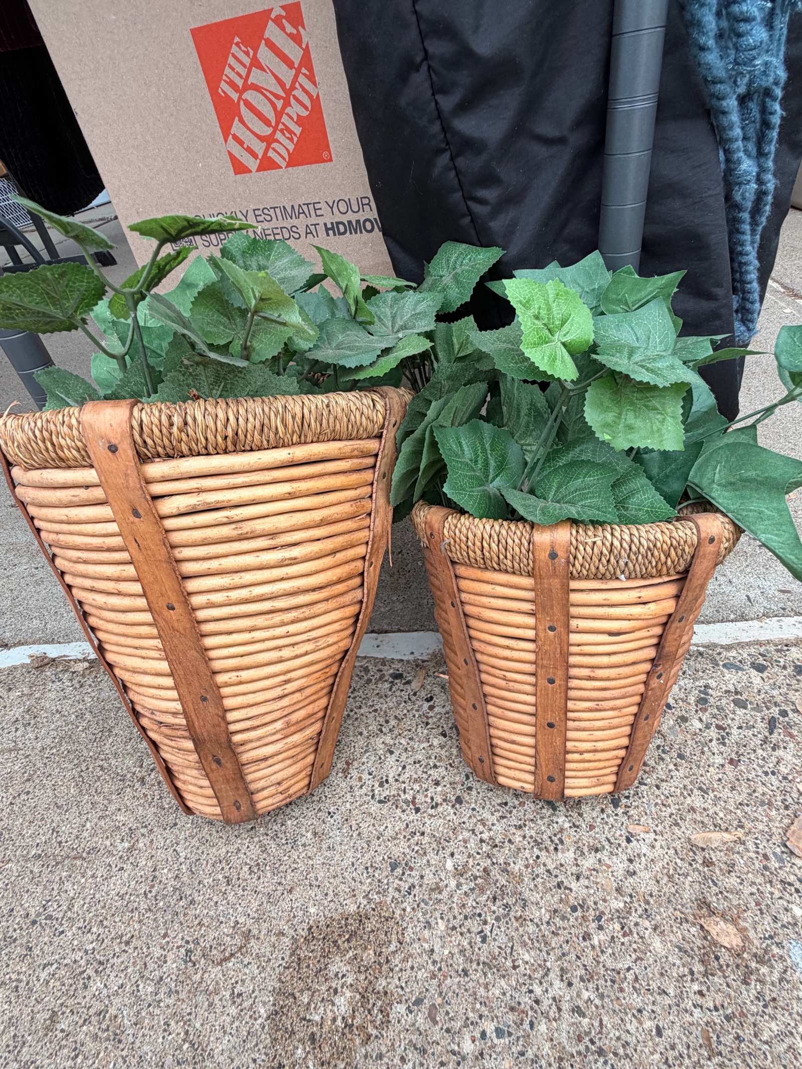 2 Wicker Basket and faux plants.